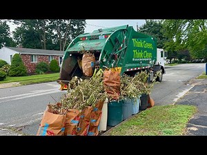WM Garbage Truck Packing Heavy Summer Yard Waste