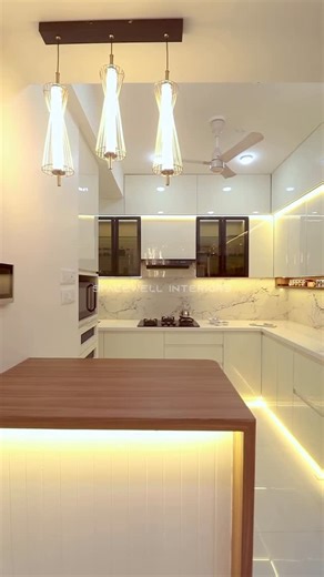 Spacewell Interior LLP on Instagram: "The heart of the home, refined. Clean lines and calm vibes. 📍 Majestique Signature Towers,Balewadi 📞 9665282676 #kitchendesign #interiordesign #kitchen #homedecor #kitchendecor #design #interior #homedesign #kitchenremodel #kitcheninspiration #kitcheninspo #home #kitchenrenovation #architecture #kitchenset #interiordesigner #interiors #renovation #bathroomdesign #kitchenisland #kitchencabinets #decor #kitchengoals #kitchenideas #furniture #kitchensofinstag