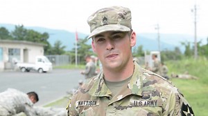 U.S. and JGSDF members discussing different weapon systems