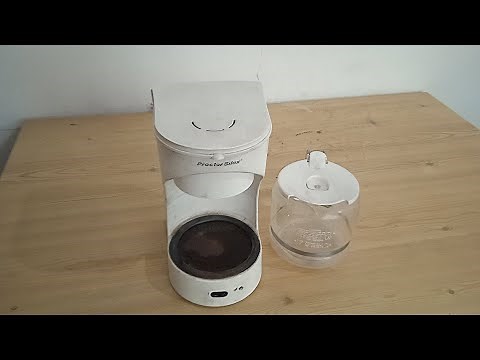 como reparar una cafetera que se calienta pero no expulsa el agua