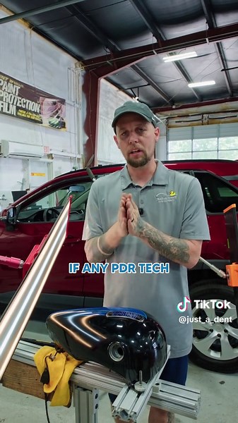 PSA: Motorcycle tanks can be fixed. 🏍️💥 Never glue pull over stickers. Never listen to techs who say tanks can’t be repaired. This one had two dents — and we knocked them out in 15 minutes. 🎥 Catch the full shop vlog on our YouTube channel — full repairs, real talk, and zero excuses. Link in bio. #JustADent #TankRepair #MotorcyclePDR #ShopVlog #PaintlessDentRepair