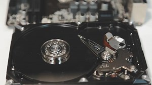 Download Close up portrait of computer engineer's hand is holding CPU's computer. for free