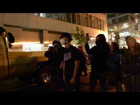 Portland police face-off with protesters using tear gas and flash bang grenades