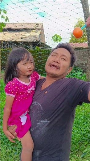 The baby picks rainbow candy for his poor grandfather to eat. #shorts #baby #cute