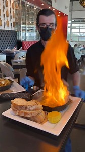"Italian Style" Cheese Saganaki Flambéed Tableside 😍🧀🔥 #cheese #queso #saganaki #fromages | Foody Fetish