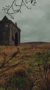 Hermitage Castle, hidden deep within the remote Liddesdale Valley in the Scottish Borders, is one of Scotland’s most atmospheric and mysterious fortresses. Built in the 14th century, it served as a formidable stronghold guarding the turbulent Anglo-Scottish border, earning a fearsome reputation as the “guardhouse of the bloodiest valley in Britain.” Its massive stone walls and stark, austere design reflect its role as both a defensive fortress and a place of power during centuries of border conf