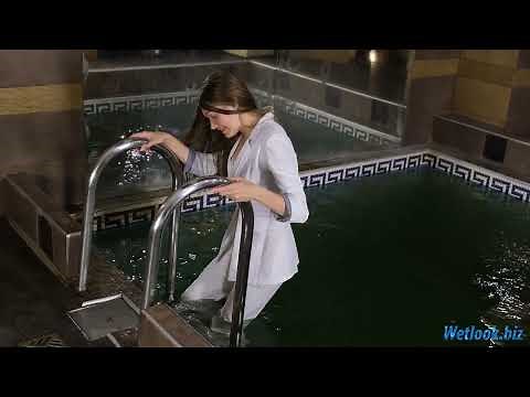Wetlook White Outfit Enjoys a Relaxing Wetlook Pool Moment