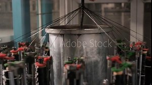 Vertical high-speed modern braiding machine. Equipment for making braids from metal wire. Stock Video
