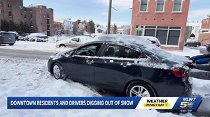 Downtown Cincinnati residents and drivers digging out of snow after storm