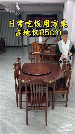 large round table for 12 people, which folds up to take up only a small area.Very space-saving,