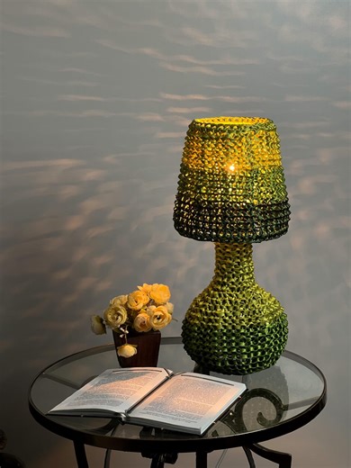 Green woven table lamp for the bedside. Handmade