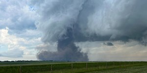 Videos from Canada show large tornado that caused injuries, damage spinning across landscape in Alberta