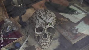 Scull. A human skull lies on a shop window.