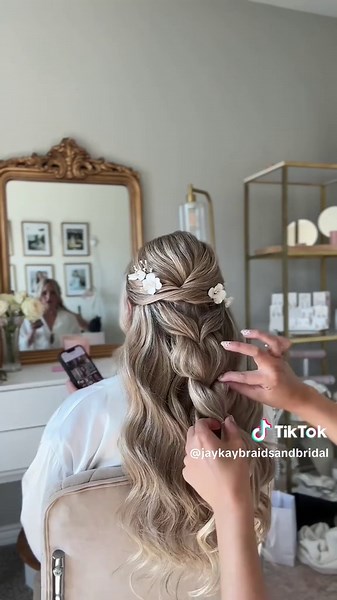 Romantic Bridal Half-Up Hairstyle with Floral Pins