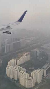 Flight window view in sky and landing view experience...