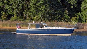 SPONSORED CONTENT: MJM Yachts 50z is an innovative cruising yacht with three unique and versatile second master suite layouts. In her great cabin layout, the daytime privacy includes three spacious areas for work, relaxing, or dining. The protection of her HVAC controlled bridgedeck converts with opening front windows, sides, and aft wall to take advantage of a perfect day. | Soundings Magazine