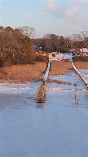 Snow on the ground, a new frame beginning, and a surprise visitor from under the dock 🦊 Riverfront builds always have a story. | CMM Inc.