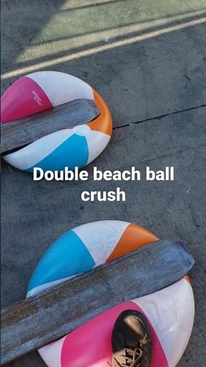 crushing two beach balls at once