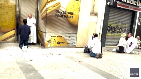 Priests hear confessions on Champs-Elysees ahead of papal mass