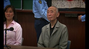 Tattered World War II flag brings two families together