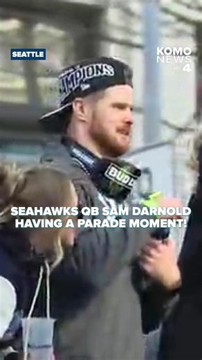 Seahawks quarterback Sam Darnold having fun atop the victory parade bus Wednesday! We love our Hawks! 💚💙
