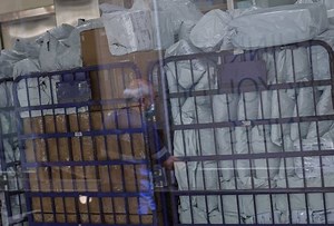 US slashes 'de minimis' tariff on small China parcels to as low as 30%