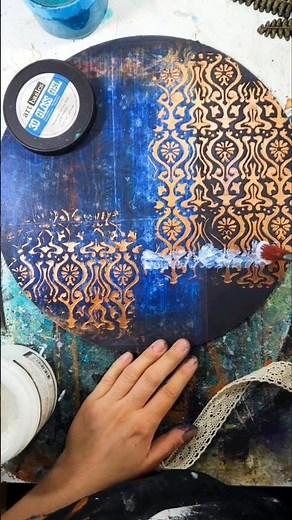 You can apply Finnabair Decoupage Fiber paper to a wooden board using Finnabair Soft Gel Medium