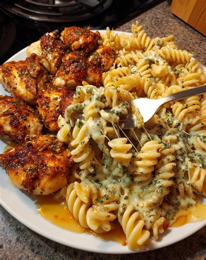 24K views · 99 reactions | Velvety Garlic Chicken and Rotini with Mozzarella Alfredo | Homemade Cooking Recipes | Facebook