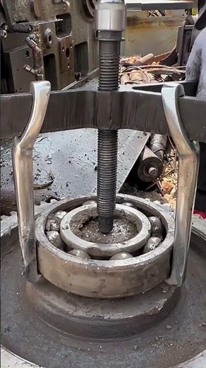 How to Remove a Stuck Roller Bearing Using Two-Jaw Puller Tools