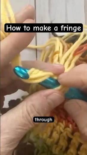 Making a fringe for my happy Hippy Scarf Tutorial linked here #crochet #crochetscarf #crochetproject