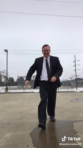 Outdoor Performance with a White Object in Formal Attire