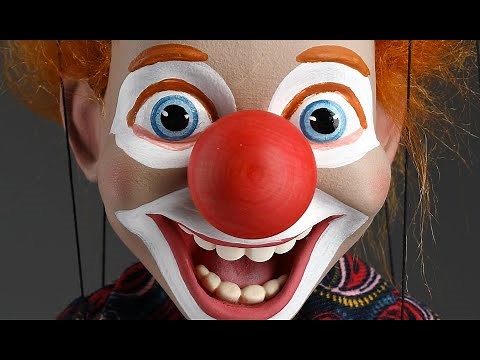 Cheeky clown : marionette playing in the shop