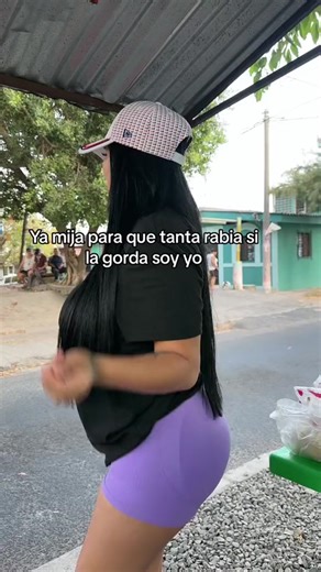 Fun Dance Moves by a Woman at a Bus Stop