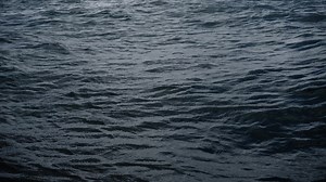 Fly Over Disturbed Ocean Water Surface