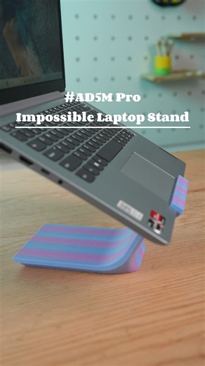 Flashforge on Instagram: "A laptop flat on the desk never feels right. 3D printed this stand with the Adventurer 5M Pro for better angles, airflow, and desk vibes. 🖥️ Design by: Protoprints(Makerworld) #3dprinting #3dprints #laptopstand #flashforge"