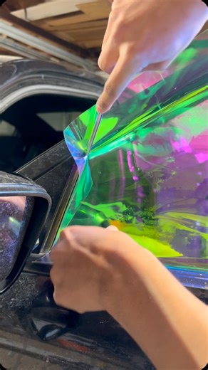 Bryan Tonche on Instagram: "Installing iridescent window tint #reels #windowtint #tint #tinting #viral #reelsvideo #windowtinting #reelsinstagram #reelsvideos #viralvideos"