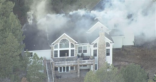 Colorado firefighters rush to put out garage fire that spread to home in Franktown