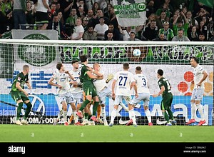 Wolfsburg, Germany. 09th May, 2025. Soccer: Bundesliga, VfL Wolfsburg - TSG 1899 Hoffenheim, Matchday 33, Volkswagen Arena. Wolfsburg's Jonas Wind (M) scores the goal to make it 2-1. Credit: Swen Pförtner/dpa - IMPORTANT NOTE: In accordance with the regulations of the DFL German Football League and the DFB German Football Association, it is prohibited to utilize or have utilized photographs taken in the stadium and/or of the match in the form of sequential images and/or video-like photo series./