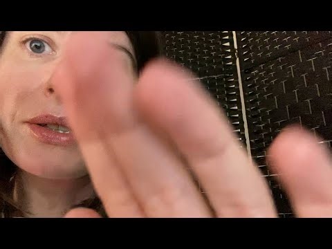 ASMR chat with soothing hand movements.