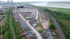 Modern UK real estate housing construction site survey urban industrial project aerial descending view Stock Video