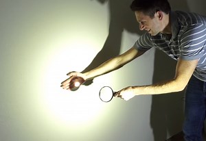 Watch the world's brightest flashlight burn stuff