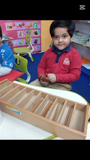 Today, the Junior Year(A) students worked with the Montessori Spindle Box. The children enjoyed placing the correct number of spindles in each compartment, matching the numerals from 0 to 9. This hands-on activity helped them understand the concept of quantity, number recognition, and the idea of zero. Students participated with interest and showed good understanding of counting and one-to-one correspondence. | Roots Millennium Schools Mayfair Campus, I-8/4 Islamabad