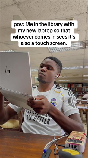 Showcasing My New Touchscreen Laptop in the Library