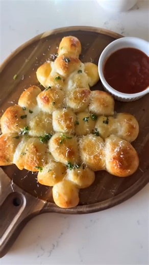 Jane | Easy Kid-friendly Food + Recipes on Instagram: "🎄 Need a fun holiday idea for the kids? Make this easy Christmas tree pull-apart bread! It’s so fun and easy and tastes so good too. 🎄Comment RECIPE and I’ll send it straight to your dm! Let the kids help roll out the dough and cut up the cheese and form into a ball. It’s a good one for the kids to get involved! #HolidayRecipes #ChristmasTreeBread #FoodKidsLove #KidFriendlyFood #EasyRecipes #HolidayBaking #ChristmasIdeas #CookingWithKids #