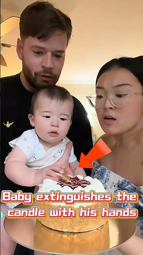 Baby Slaps Birthday Candle instead of Blowing It