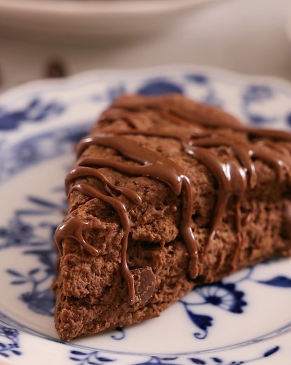 The ultimate treat for chocolate lovers, this Chocolate Scones recipe is melt-in-your-mouth amazing, full of chocolate chips and finished off with a chocolate glaze! | Preppy Kitchen