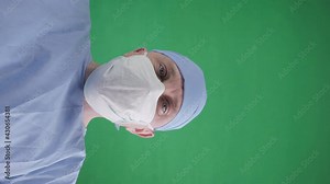 Doctor closes plastic bag with a dead body inside. A corpse in a black plastic bag in a hospital morgue. POV view, green screen background.
