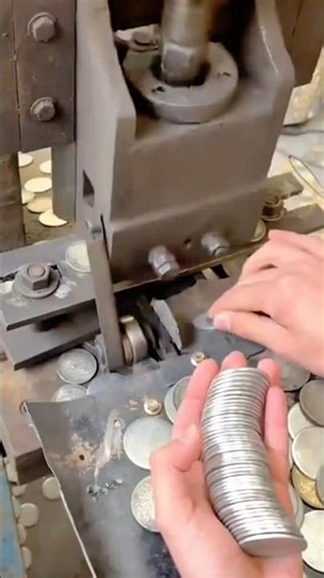 Coin Manufacturing Process A Machine Precisely Stamping Metal Coins