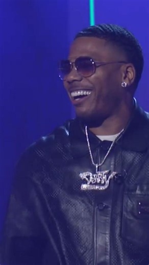 Nelly performing "Over and Over