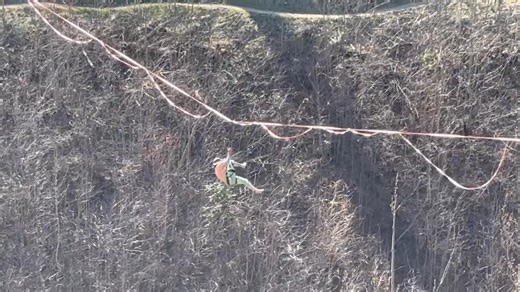These guys are pros at walking the tight rope, but good thing he had a safety harness on such a windy day at Gatlinburg Sky Park. | Meteorologist Spencer Denton